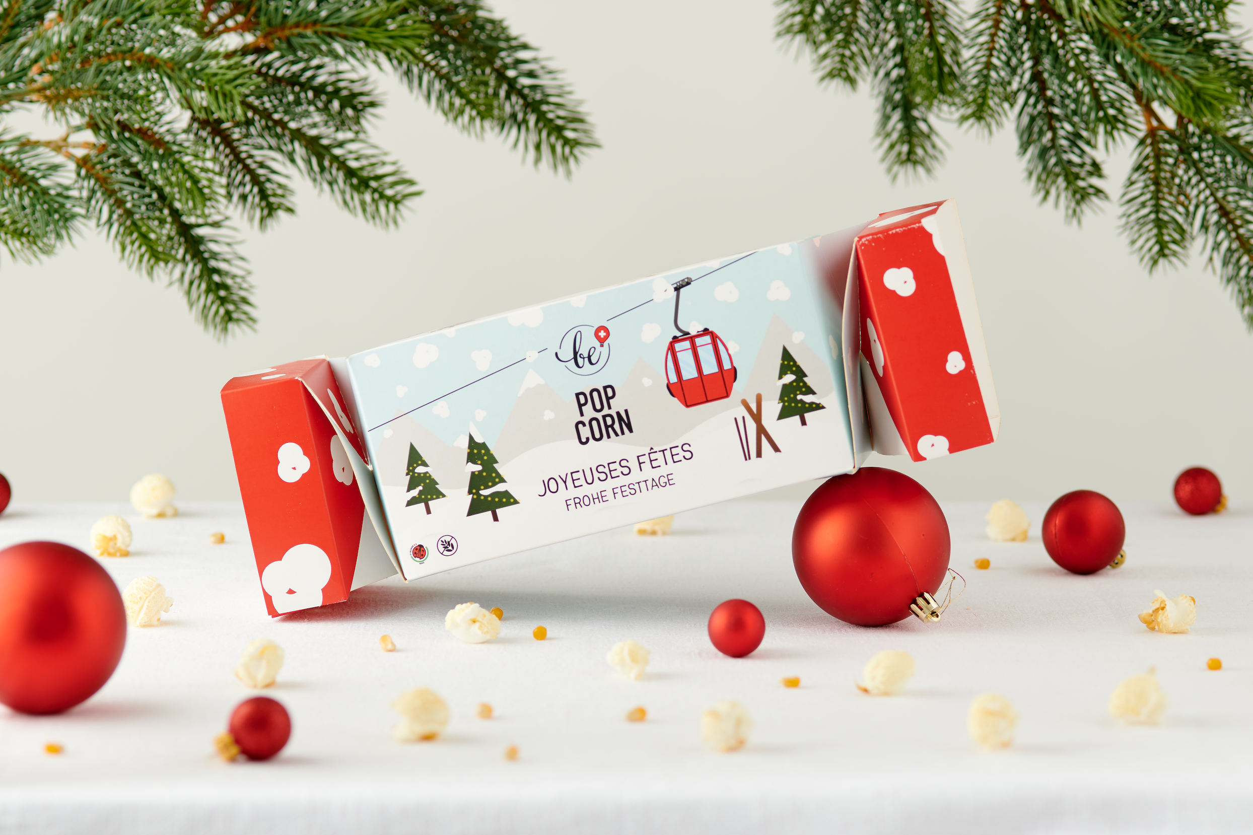 Be! Popcorn, le cracker de Noël 2024 qui regroupe 3 délicieuses saveurs de popcorn, au Pain d'épices, Chocolat au lait et le nouveau goût, Cannelle & Orange